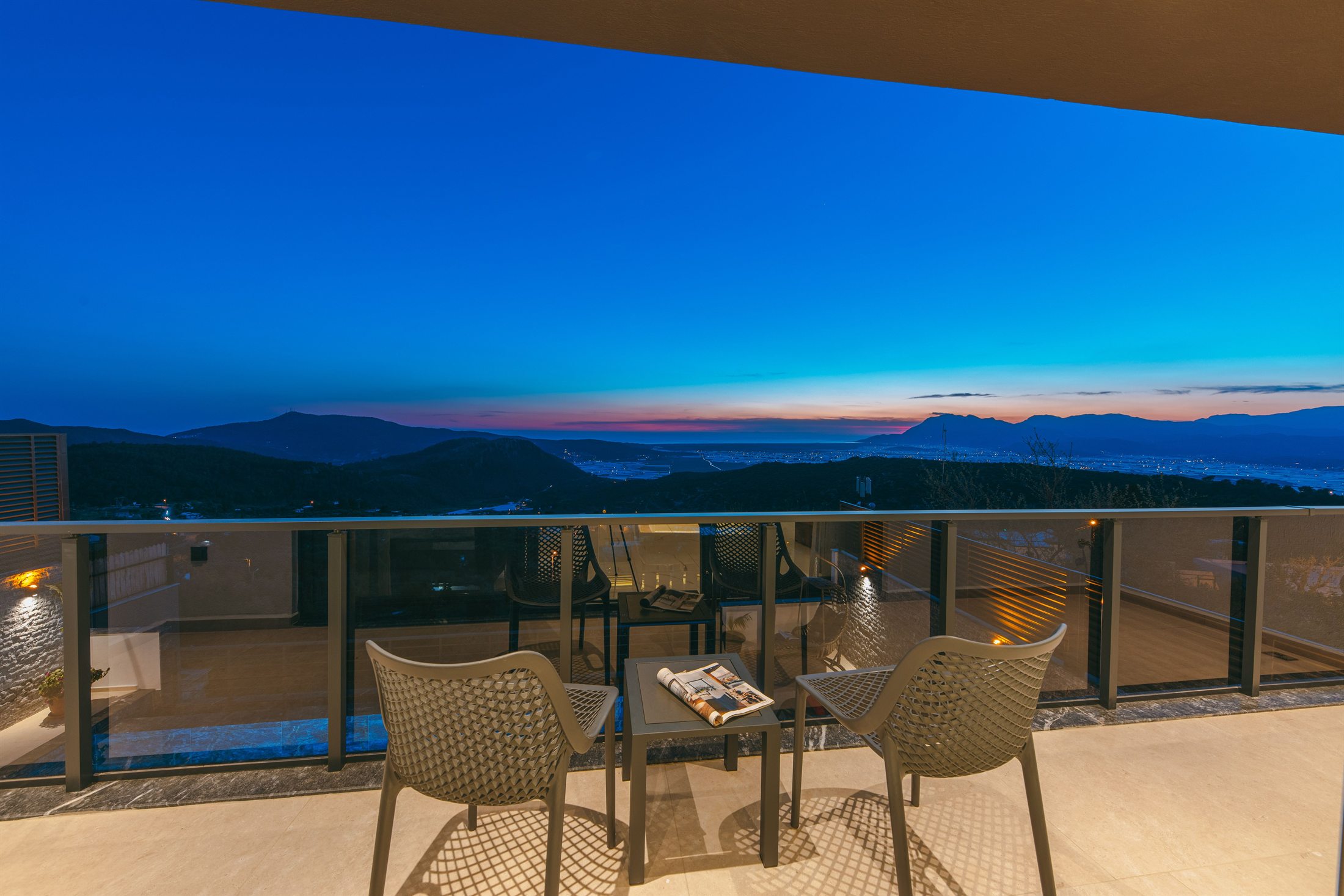 Covered terrace seating with open Adriatic sunset views