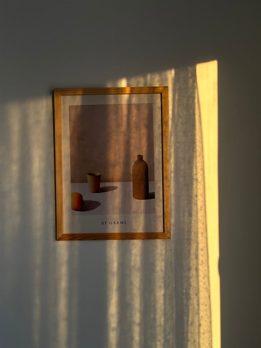 Sunlit wall art detail inside Villa Aurelia